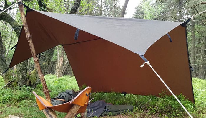 outdoor survival training - pitched tarp shelter